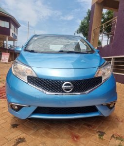 Nissan versa SR in blue colour. Front view