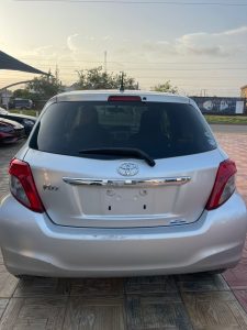 2013 Toyota vitz in silver color. Back view
