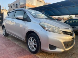 2013 Toyota vitz in silver color. Side view